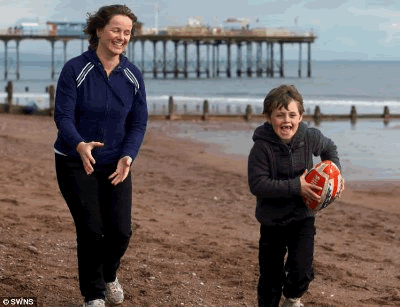 Helen Basson with her son